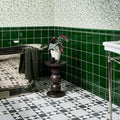 Victorian Style Porcelain Finchley Pattern Soft Grey grey geometric tiles with a three-tiered pedestal table