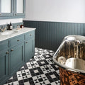 Victorian Style Porcelain Frame geometric frame border tiles with a chrome bathtub