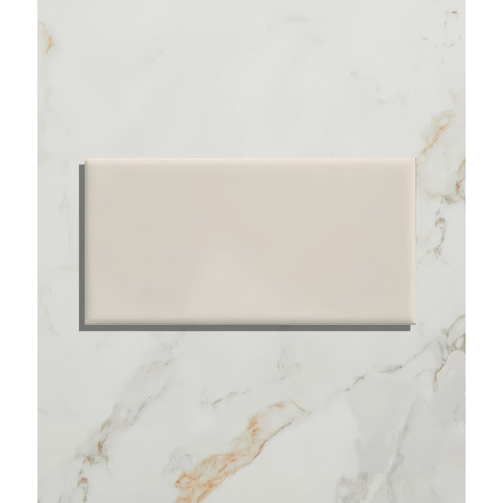 Cream-colored rectangular ceramic tile with smooth glossy finish from Victorian Style™ wall ceramic cotton white metro collection