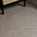 Gray vienne limestone satino floor tiles with subtle texture and natural color variations for elegant flooring