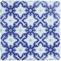 Blue and white ceramic tile villette on papyrus with intricate repeating geometric pattern
