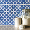A clear glass jar with a metal clasp lid filled with flour from villette on papyrus product line