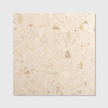 Beige rialto terrazzo san michele honed tile with speckled light and dark stone fragments surface