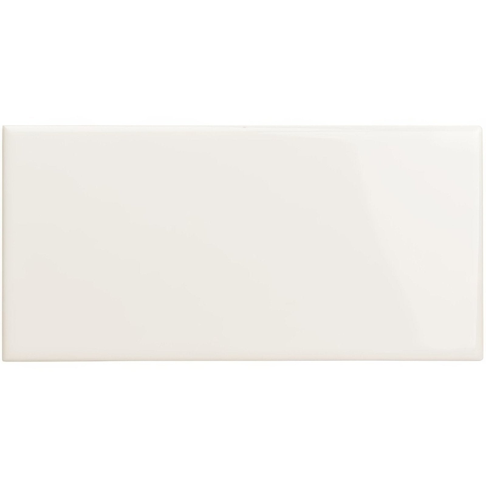 Cream-colored vintage white half tile with a glossy finish in rectangular ceramic design for wall use