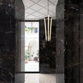 Volterra Laurent Gloss 60 x 120cm black marble-effect tiles with a pendant light