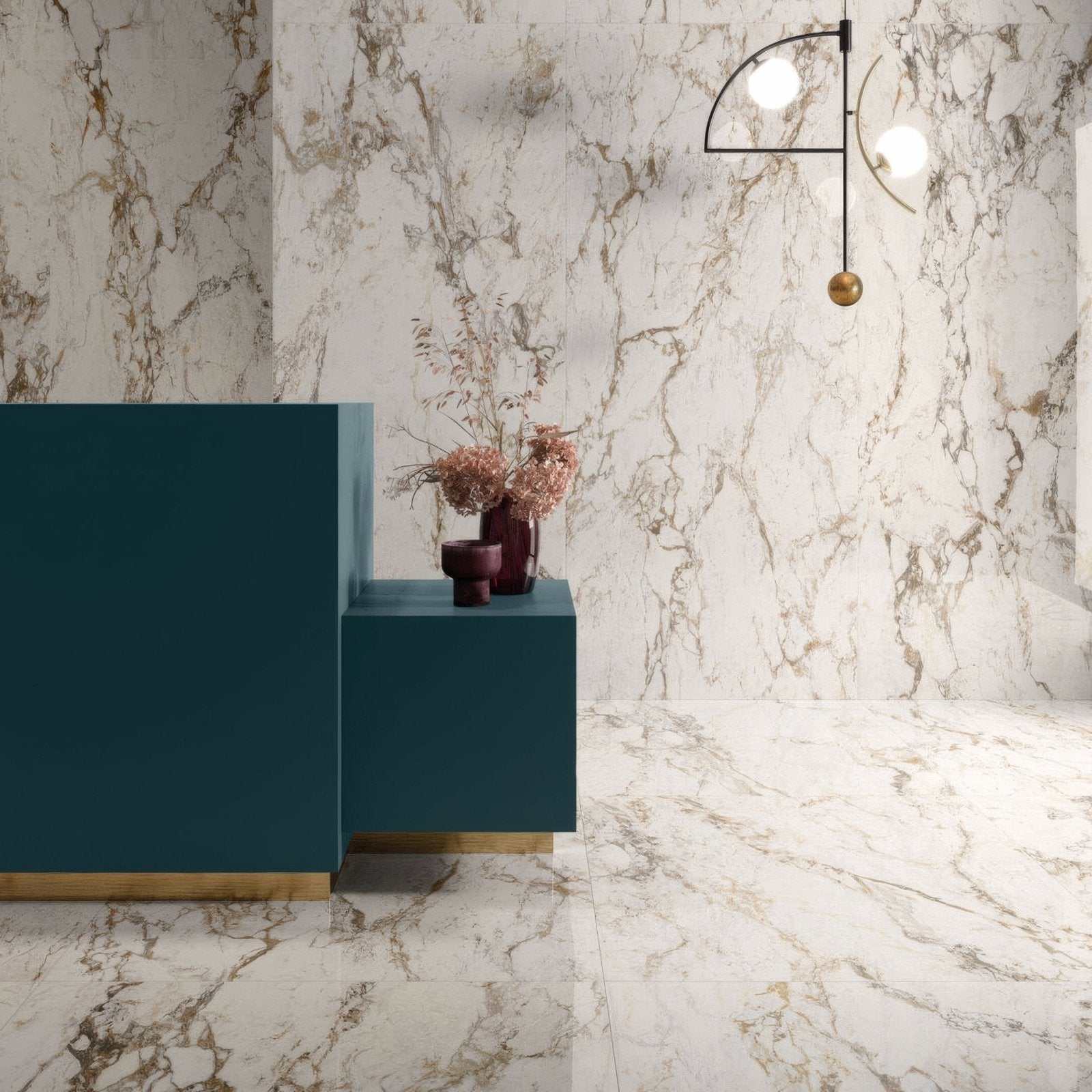 Volterra Tortona Gloss 60 x 120cm white marble-effect tiles with a teal reception desk