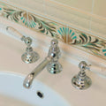 W B Simpson Shell Frieze 2-Tile Set on County White in a bathroom setting