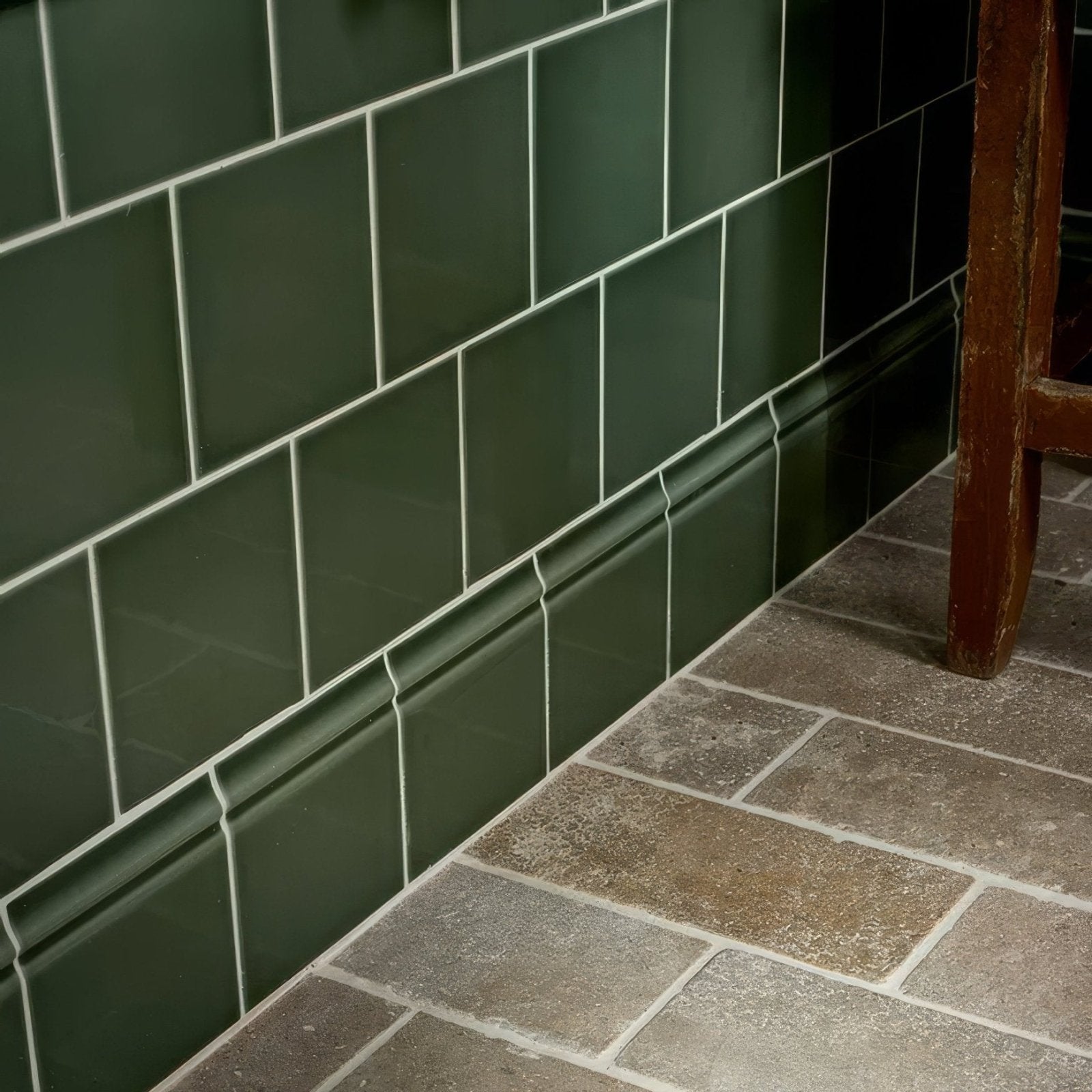 Dark green victorian style wall ceramic cabbage green rectangular tiles with glossy finish and white grout lines in subway pattern