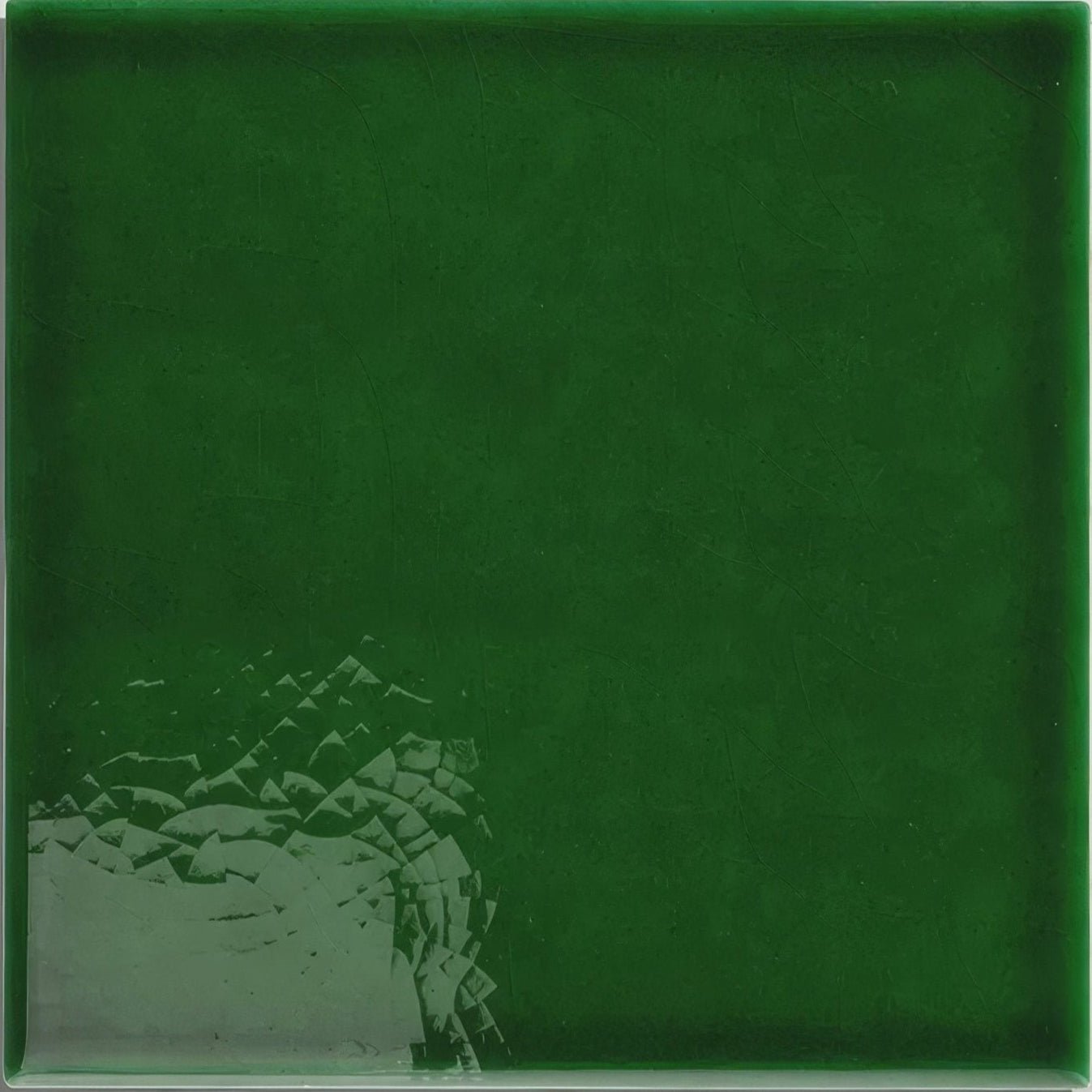 Dark green victorian style wall ceramic tile with olive green crackle glaze and subtle textured abstract geometric pattern
