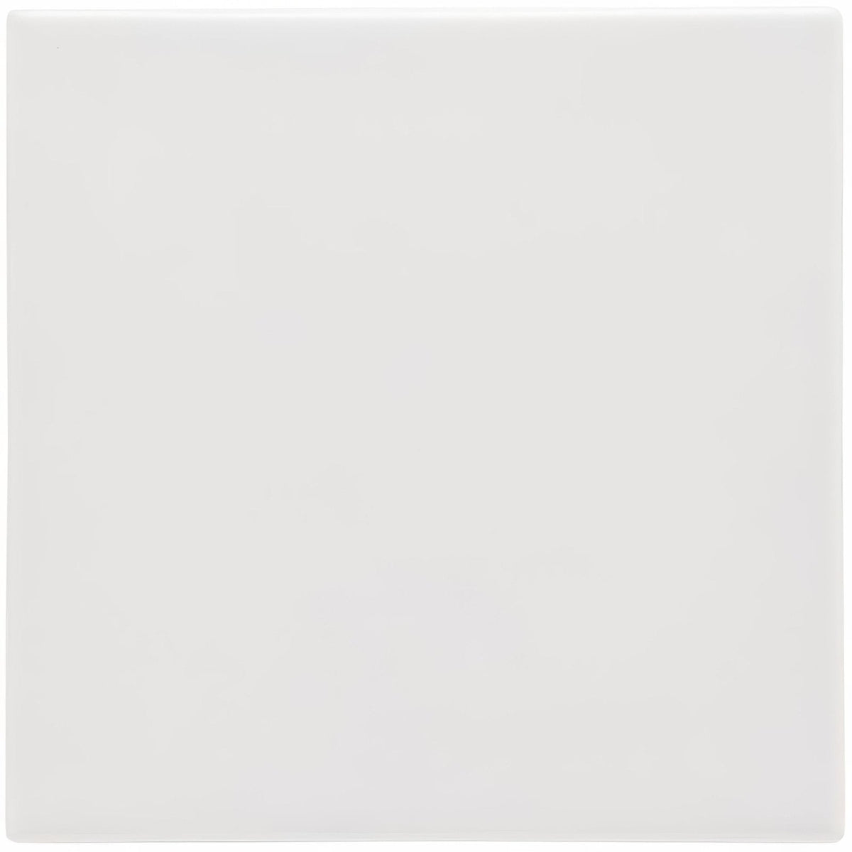 A sleek white square ceramic waveney field tile with a smooth glossy finish for wall or floor use