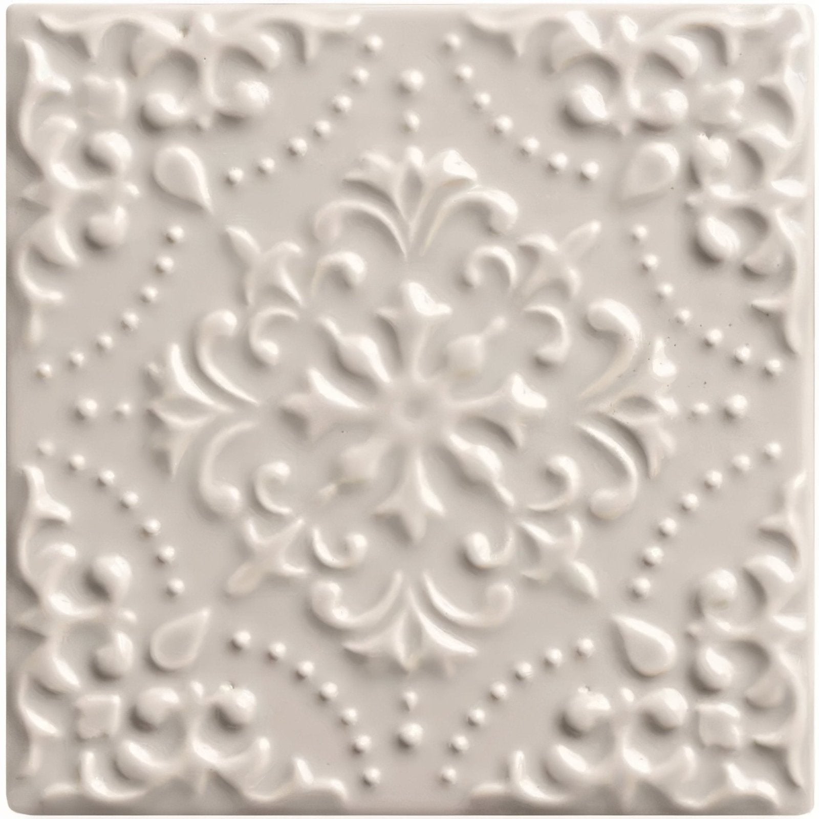 Off-white ceramic tile waveney highgrove with raised floral and dot patterns for decorative wall use