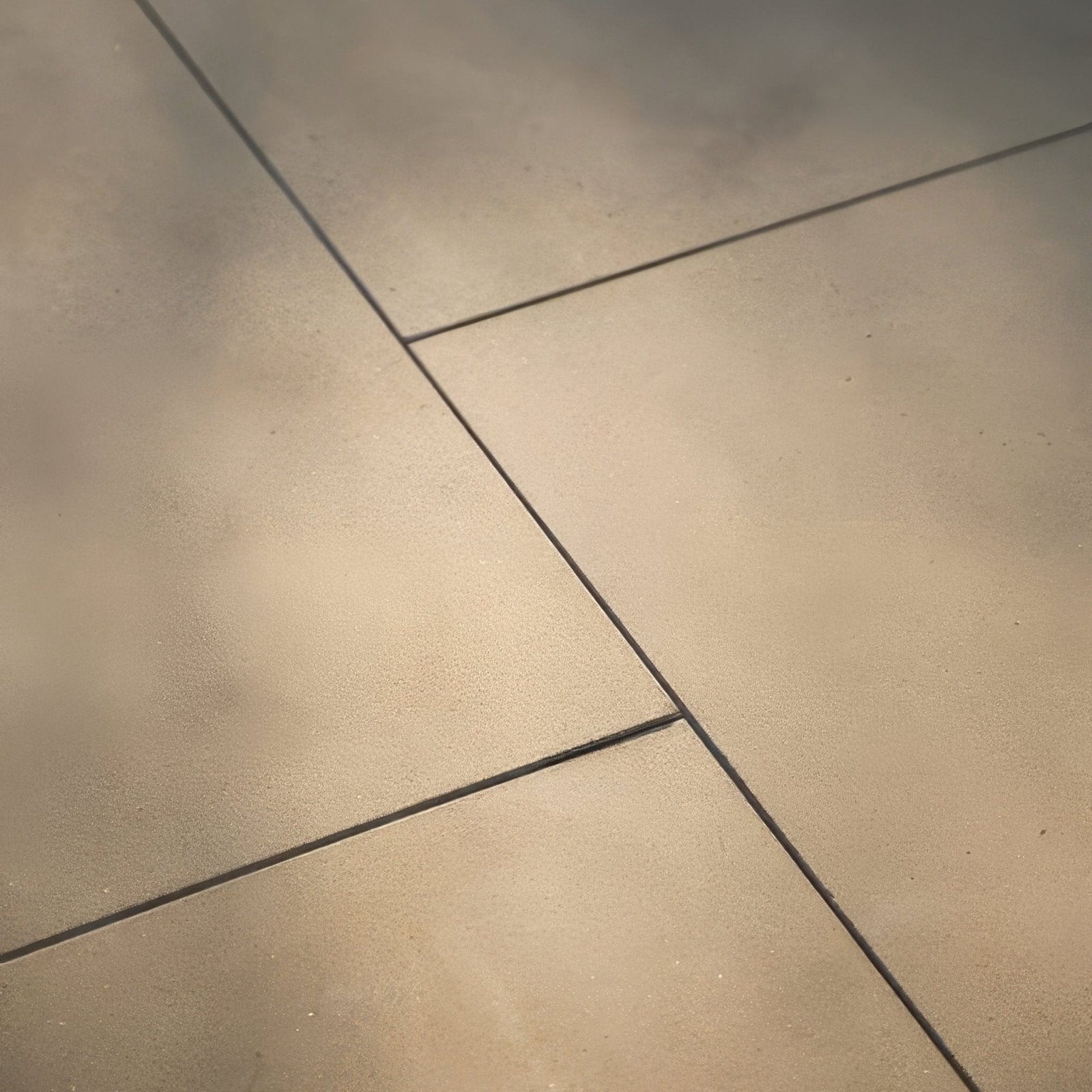 Beige sandstone honed concrete floor tiles with subtle texture and dark grout lines from wensley york sandstone