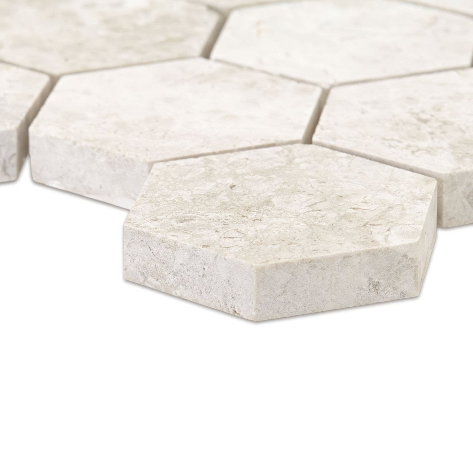 Westhampton hexagon mosaic light beige marble tiles with subtle veining and a natural polished finish