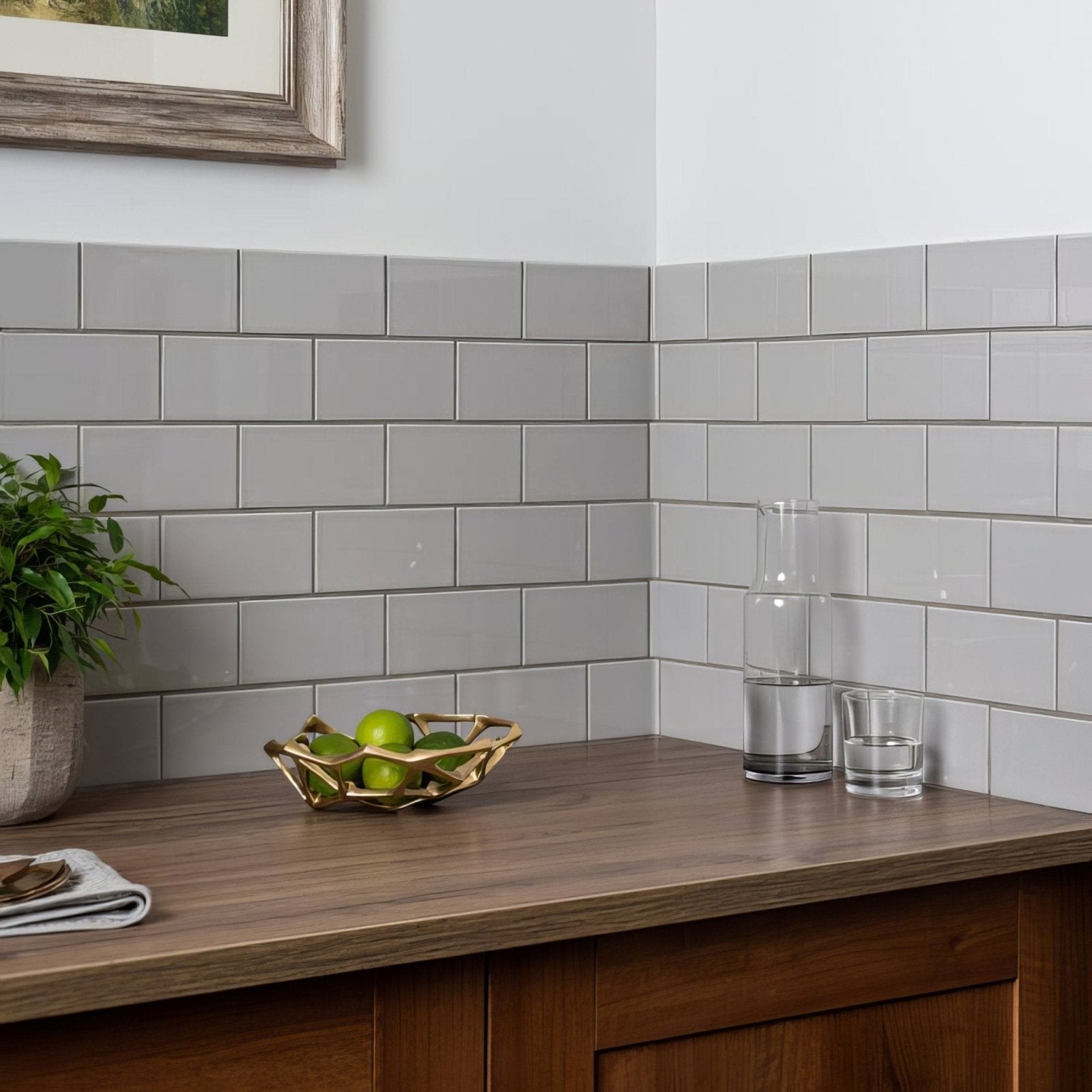 Gray glossy subway tiles used as kitchen backsplash featuring westminster grey half tile design