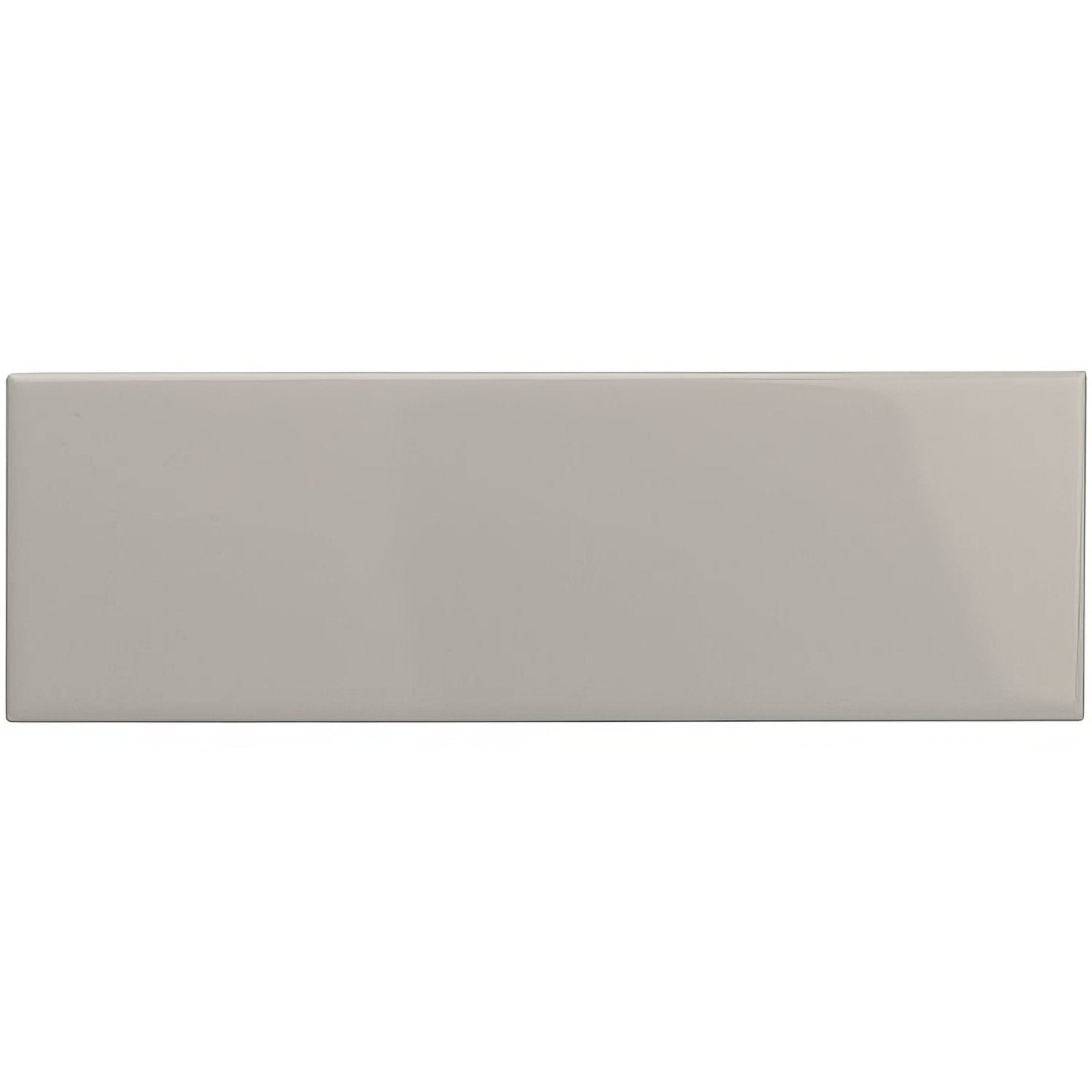 A sleek rectangular ceramic tile called westminster grey large brick with a smooth glossy gray finish