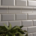 Westminster grey metro bevelled tile featuring gray glossy subway tiles with subtle sheen and clean rectangular design