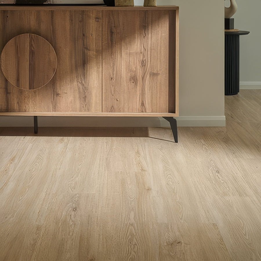Weymouth almond oak light beige wood-grain laminate flooring with a smooth modern finish