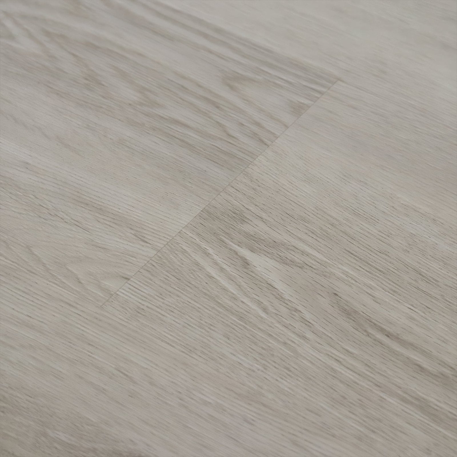 Light gray wood-grain vinyl plank flooring with subtle natural texture in weymouth seamist oak finish
