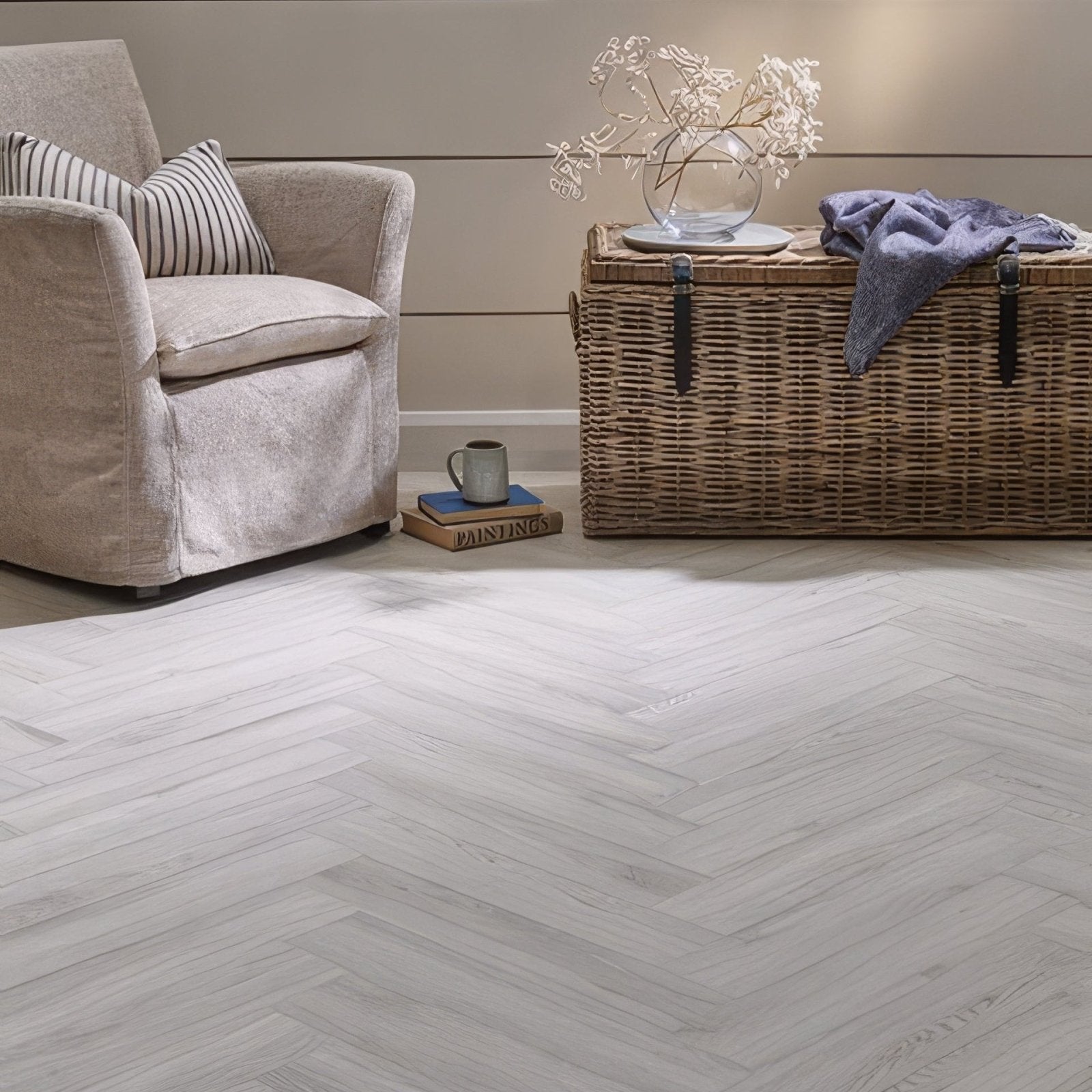 Light gray herringbone patterned wood flooring made from seamist oak in the weymouth collection