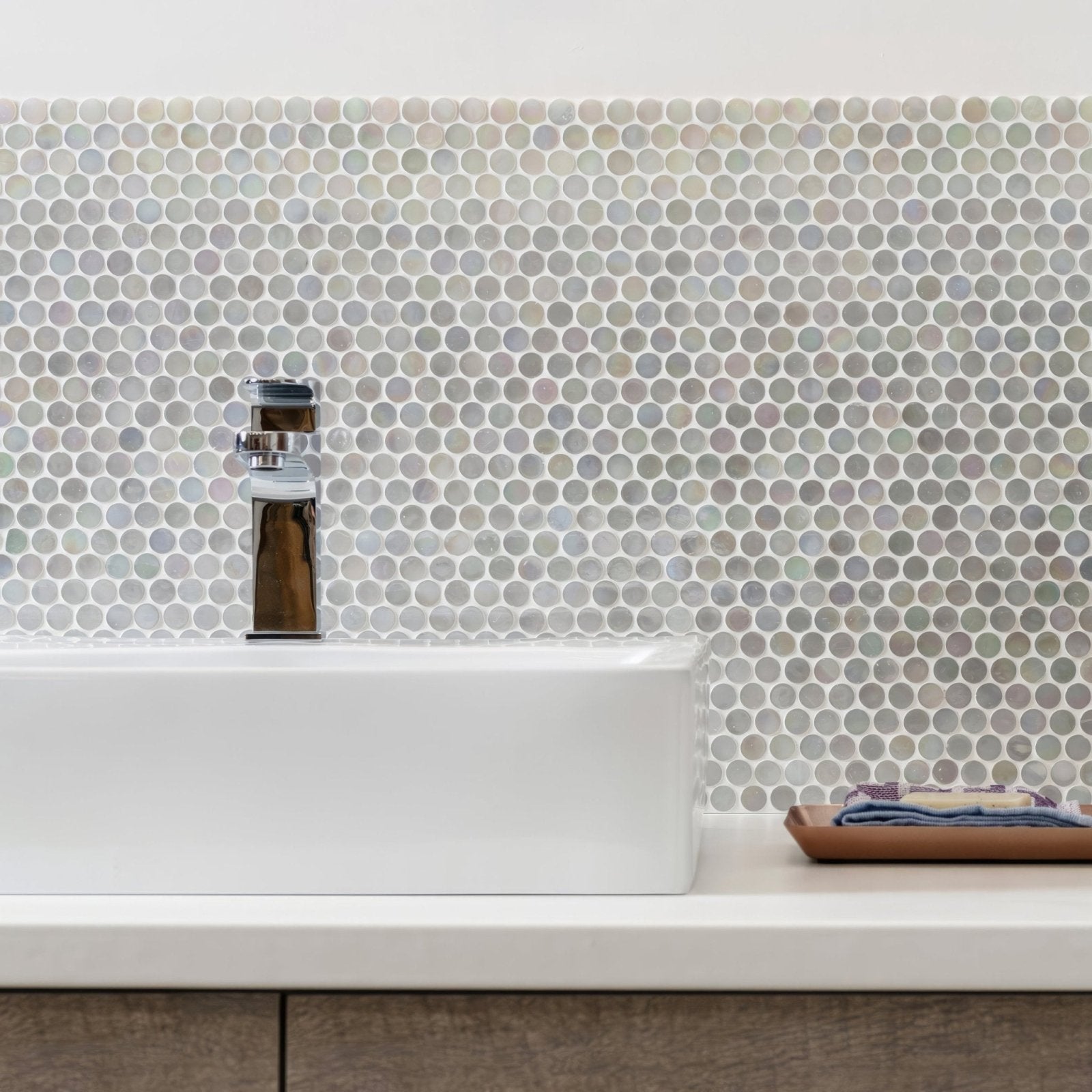 White Lady Iridescent Round Glass Mosaic iridescent round glass mosaic with a chrome tap and white sink