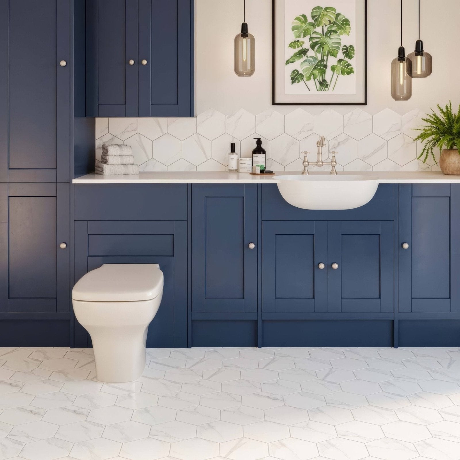 White Marble Hexagon Porcelain white marble-effect hexagon porcelain tiles with a navy shaker vanity