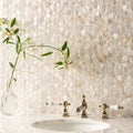 White pearl hexagon shell mosaic tile backsplash in shimmering white and cream mother of pearl for wall decor
