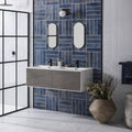White Satin Chevron white satin chevron mosaic with a floating vanity and two black taps