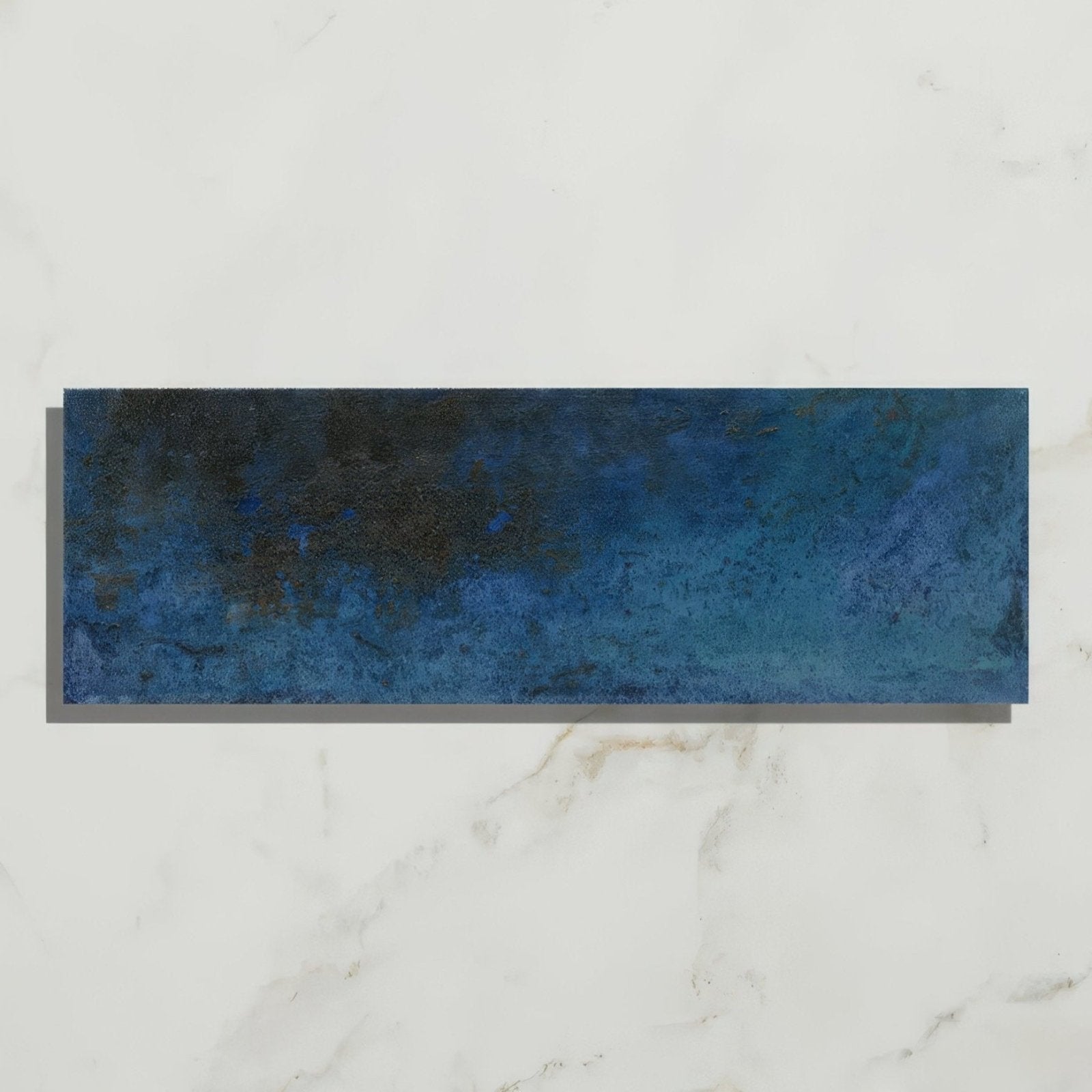 Rectangular blue ceramic tile wightwick ceramic ink with gradient navy to light shades and subtle textured dark edges
