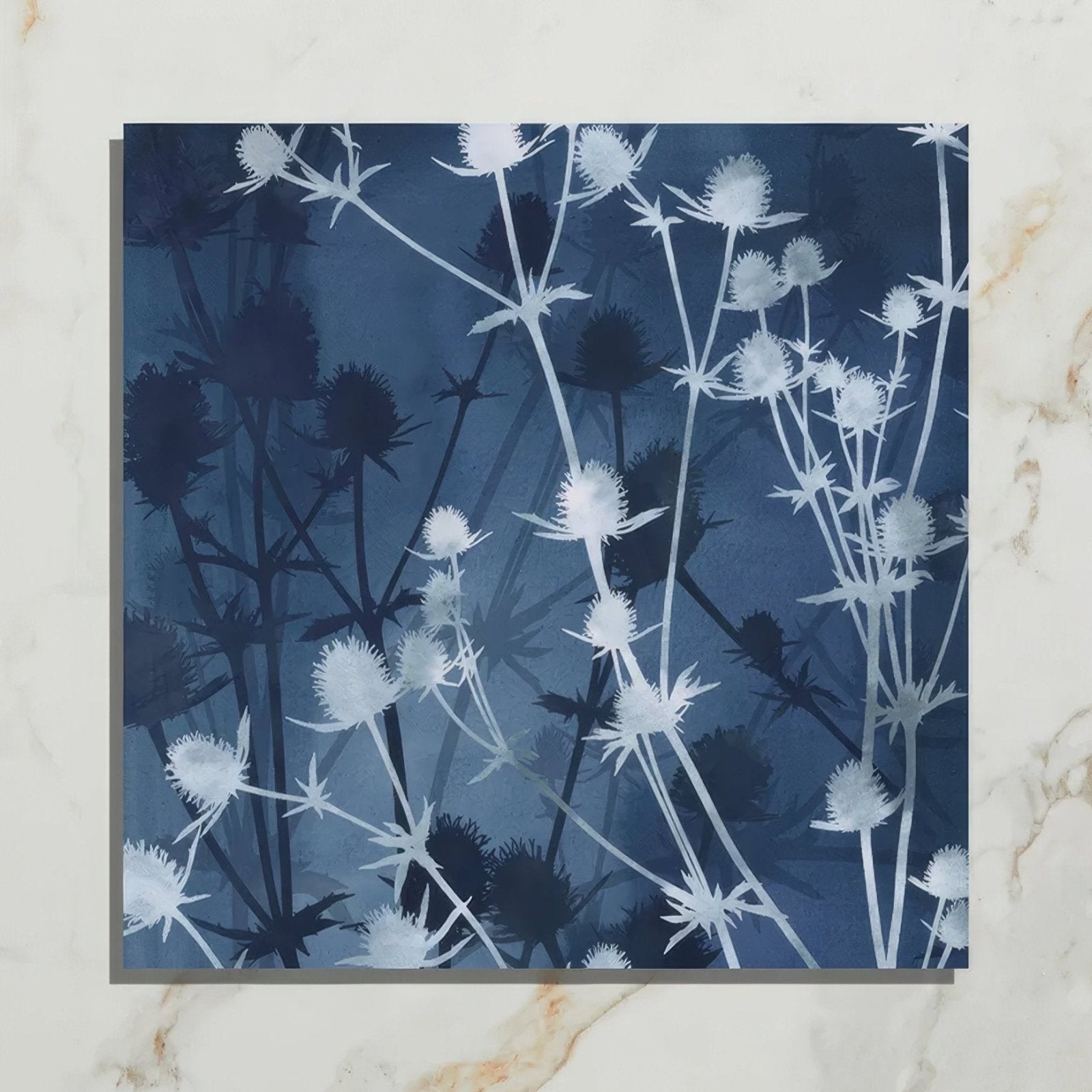 Wild Botanicals Porcelain Blue By Clarissa Hulse dark blue porcelain tile with white thistle silhouettes