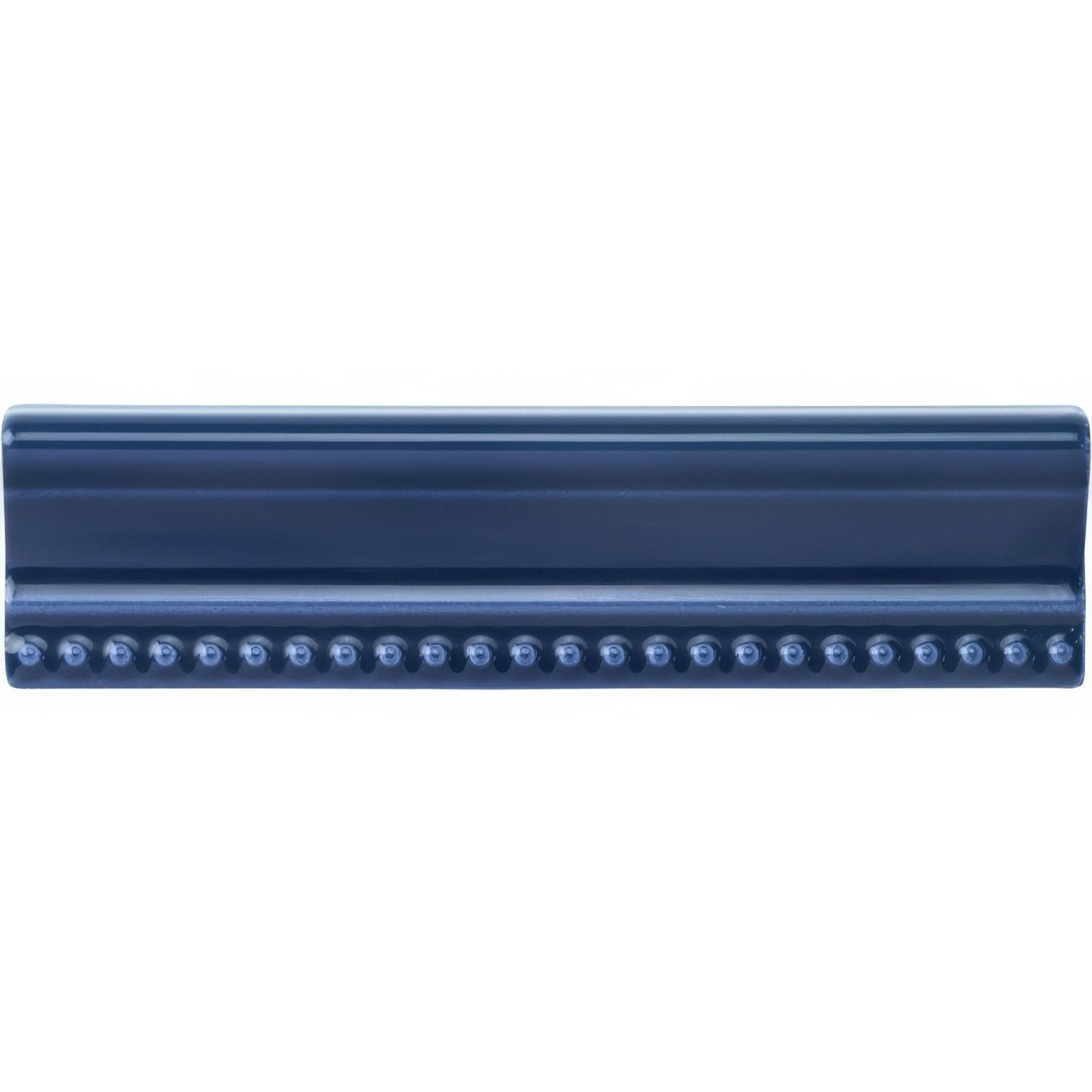 Dark blue ceramic tile with glossy finish and decorative beaded edge from windsor blue hogarth moulding collection