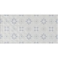 A glossy white rectangular tile with gray quatrefoil and starburst motifs from wisley on helmingham collection
