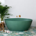 A sleek matte-finish emerald green freestanding porcelain bathtub woodland glade with a modern oval design