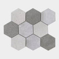 World hexagon texture grey mosaic hexagonal tile set in varying shades of gray with textured and grooved surfaces