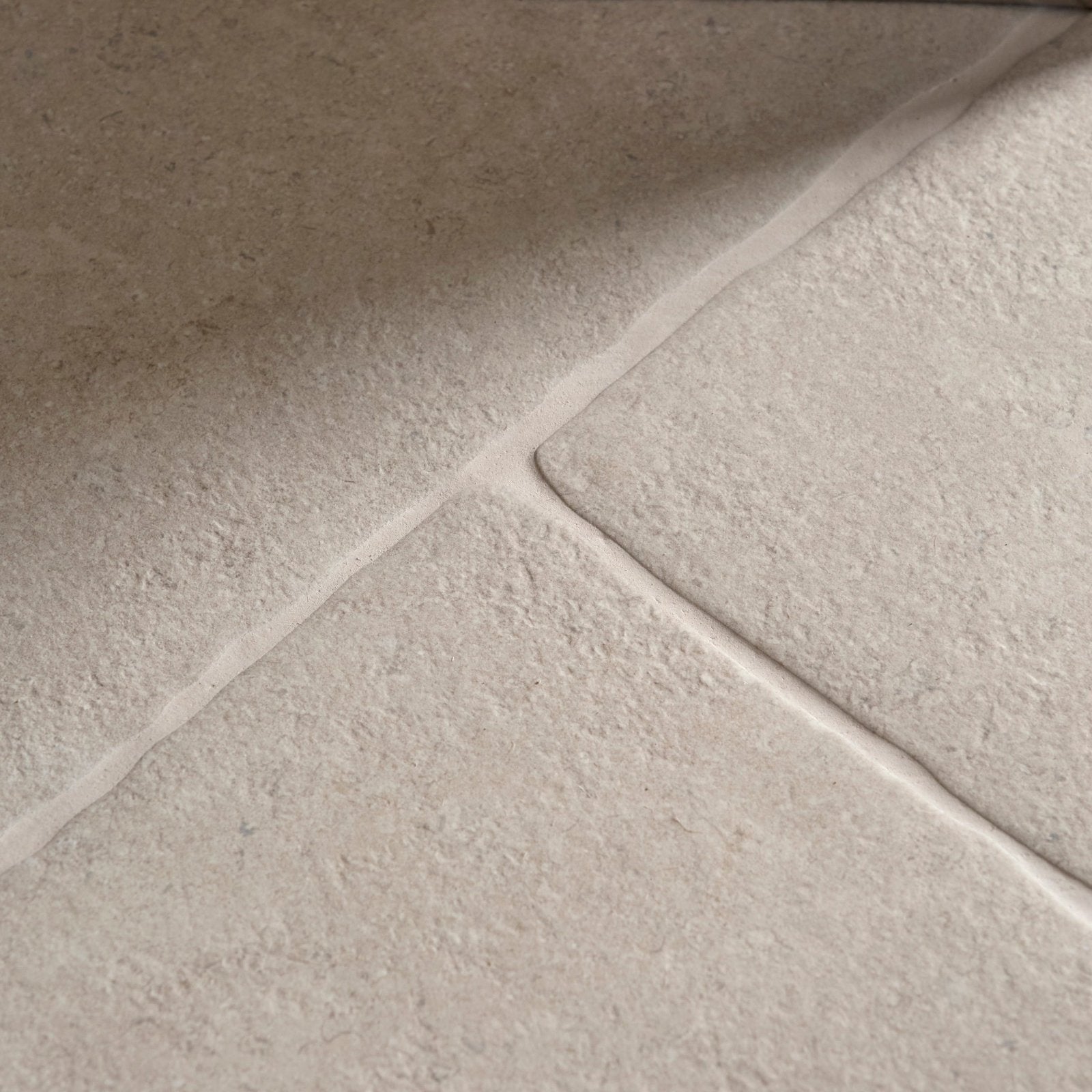 Beige textured wychwood claire porcelain matt floor tiles 60 x 90cm with subtle speckles and light grout lines