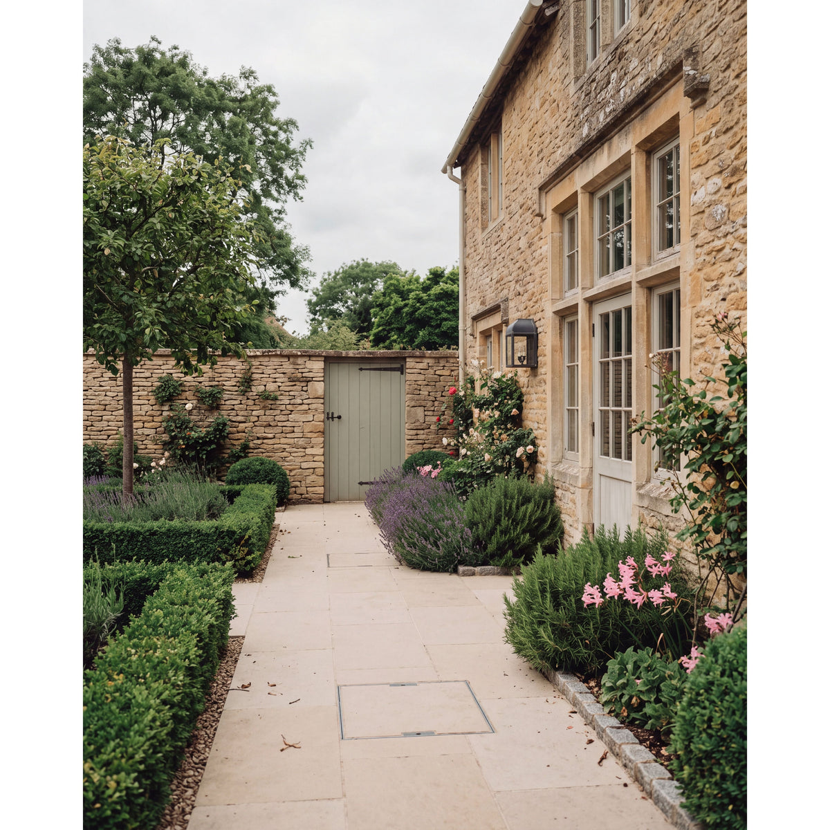 Wychwood Limestone Paving Tumbled & Etched laid in a courtyard
