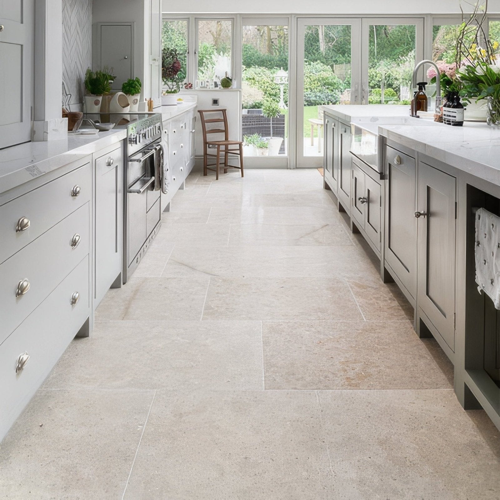 Beige wychwood limestone tumbled finish stone tile flooring with subtle natural veining in 60 x random sizes