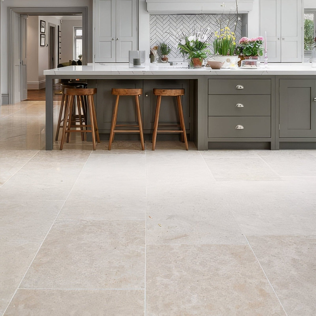 Beige wychwood limestone tumbled finish floor tiles with subtle natural veining in 60 x random sizes