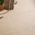 Beige wychwood porcelain paving tiles with subtle texture and natural veining for outdoor surfaces