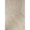 Beige-toned textured stone tiles with subtle veining in zahara porcelain arch mosaic design