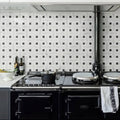 Zen Marble Grand Basket Weave Mosaic white and black marble basketweave mosaic with a black Aga range