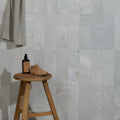 Zen Marble Honed Finish Brick white marble brick tiles with a leather shoe
