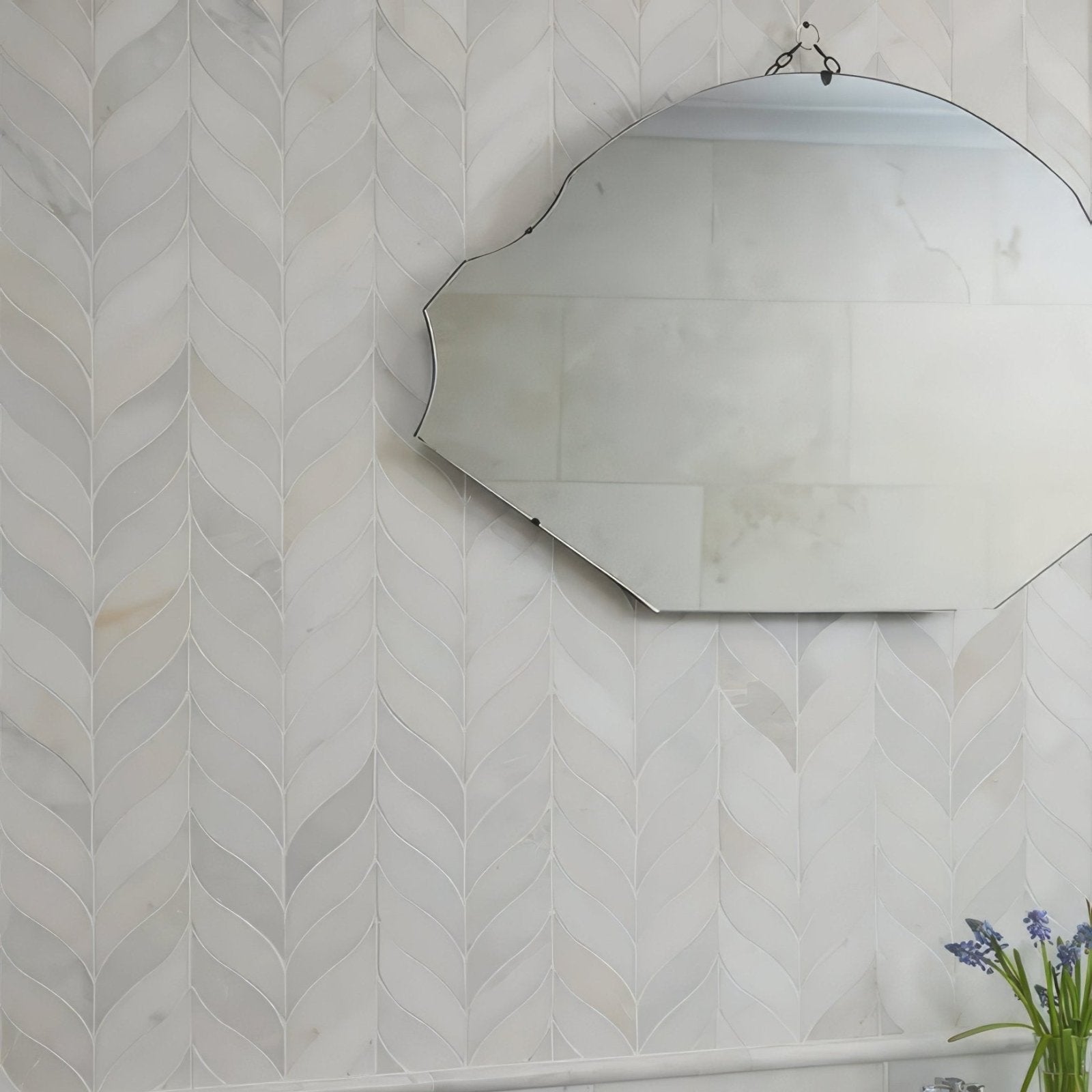 Zen Marble Leaf Mosaic light grey marble leaf mosaic with a cloud-shaped silver-framed mirror