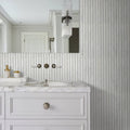 Zen Marble Reed Mosaic white marble reed mosaic backsplash with a marble vanity