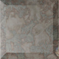 Beige and gray marbled tile antique mirror bevel finishing piece with subtle natural stone texture