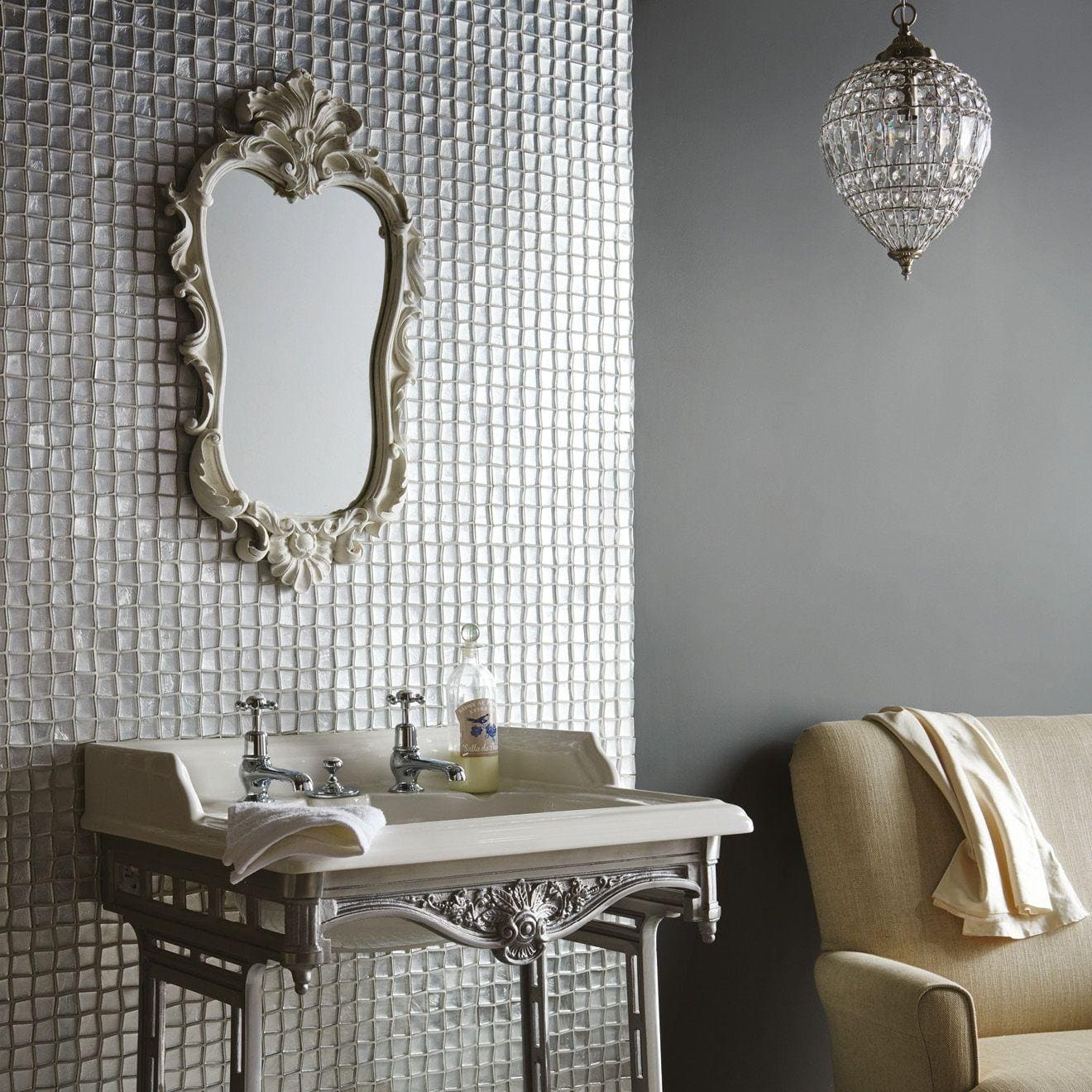Antique-style white ornate mirror with intricate floral detailing featuring ares silver foil mosaic design