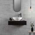 Atrium Marte Grafito Tiles grey concrete-effect tiles with a white bowl sink on a black vanity