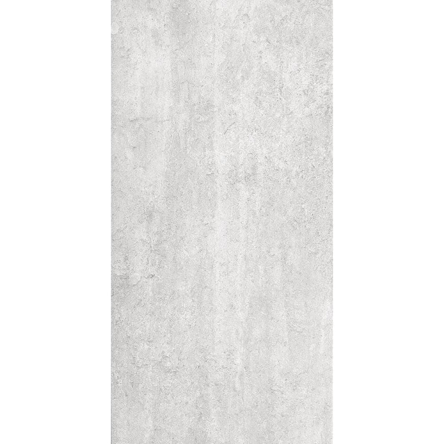 Gray textured ceramic tile with a subtle mottled finish from atrium marte gris tiles collection
