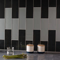 Avon Clear Glass 300 x 100mm grey glass tiles styled with white ceramic kitchen canisters