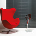 Avon Clear Glass Brick 398 x 80mm dark green clear glass brick tiles with a red egg chair