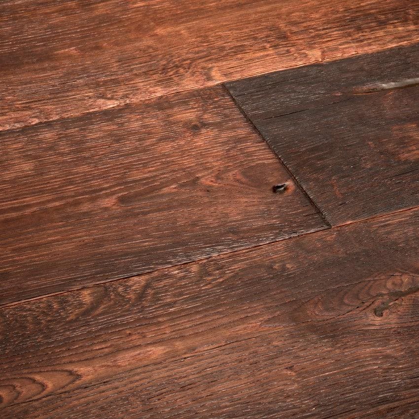 Dark brown reclaimed oak flooring with visible grain knots and rustic texture from Berkeley Priory oak collection